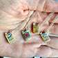 1930’s Moving Cigarette Charm Necklace