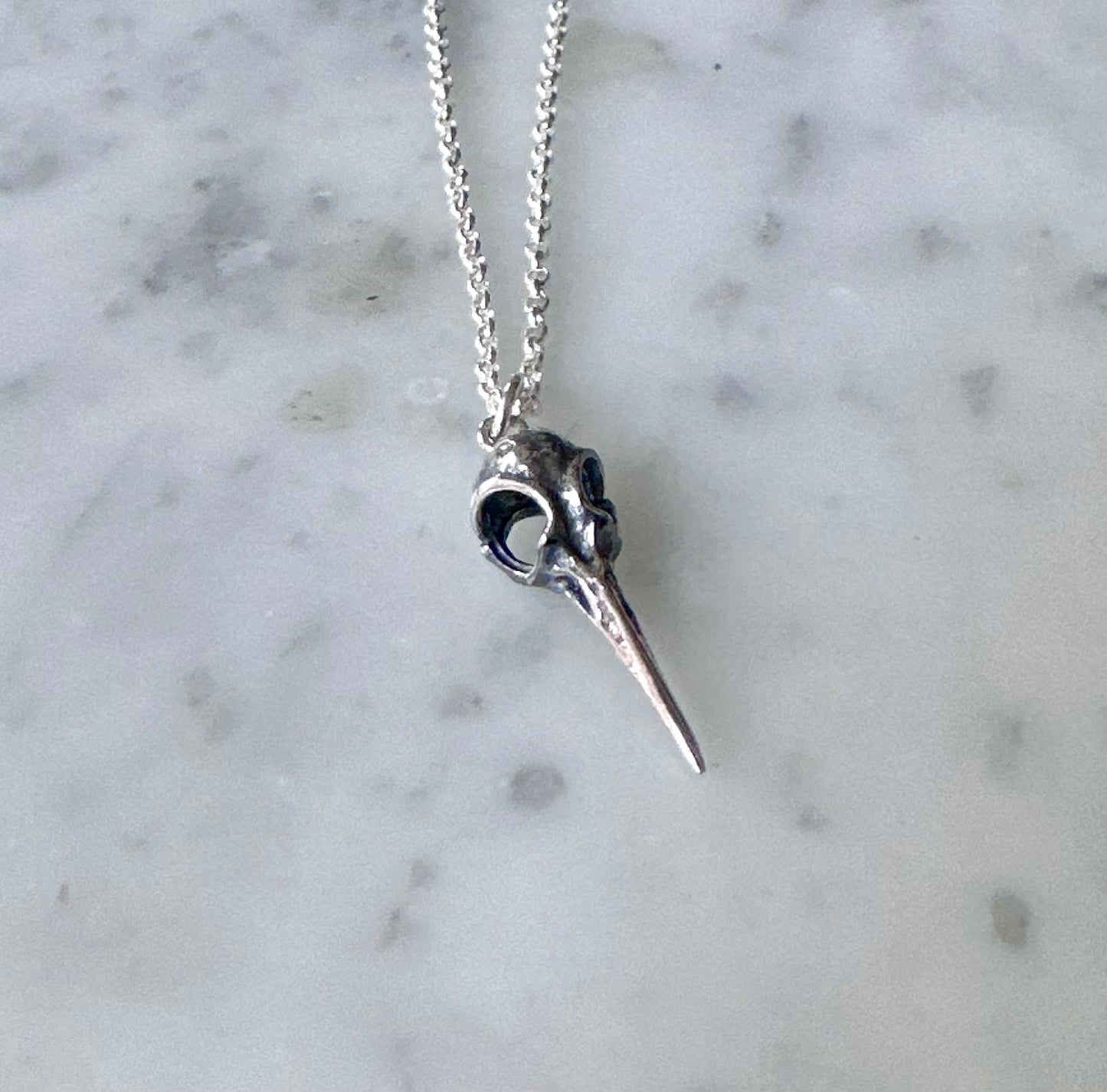 Sterling Tiny Hummingbird Skull Necklace